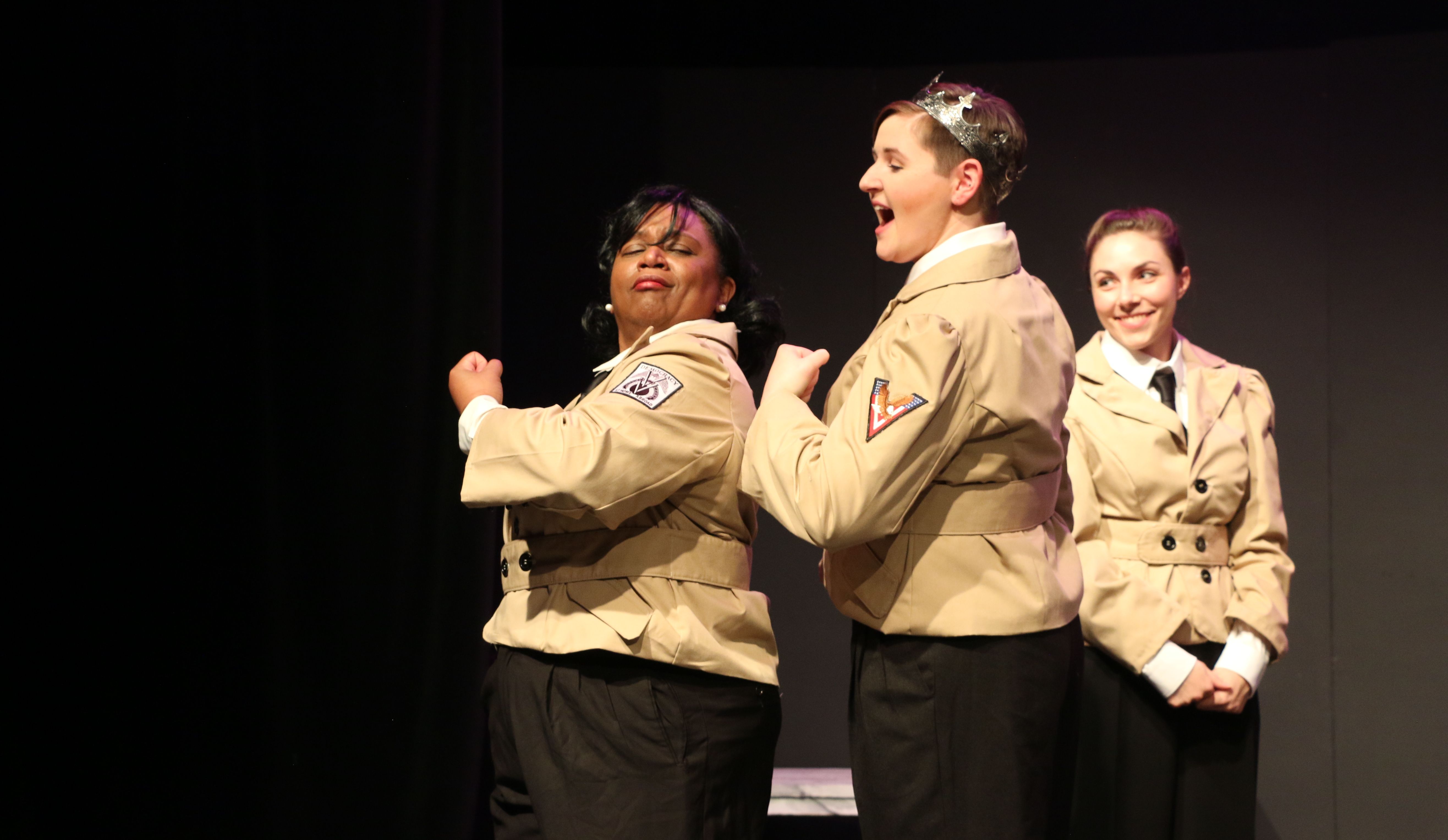 three women in uniform posing proudly for a tipping point threatre company show in columbus, ohio